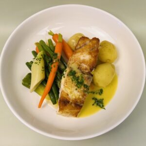 striped bass spring vegetable ragout butter sauce